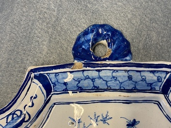 A Dutch Delft blue and white chinoiserie plaque, 18th C.